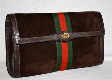 vintage gucci suede clutch|old style vintage gucci bag.